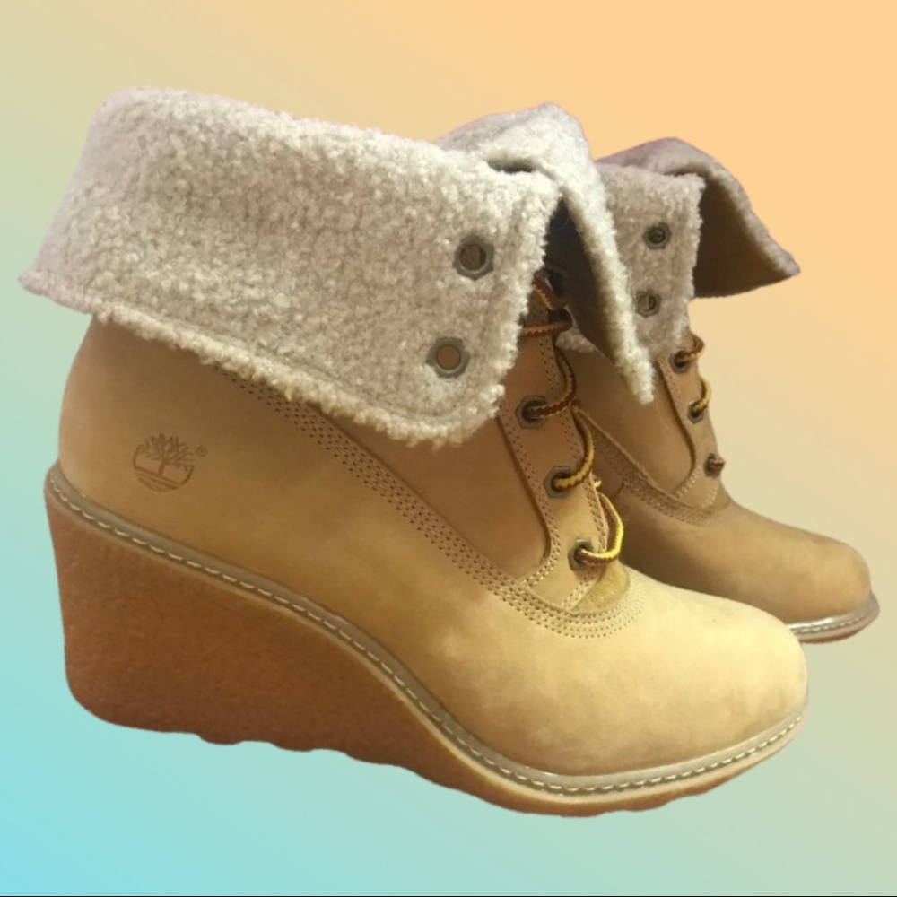 Women timberland wedge booties; size 7